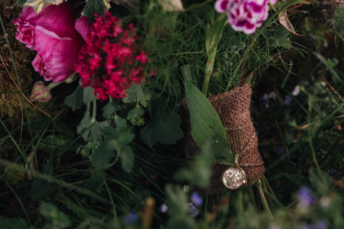 close up of a a bride's bouquet and jewellery