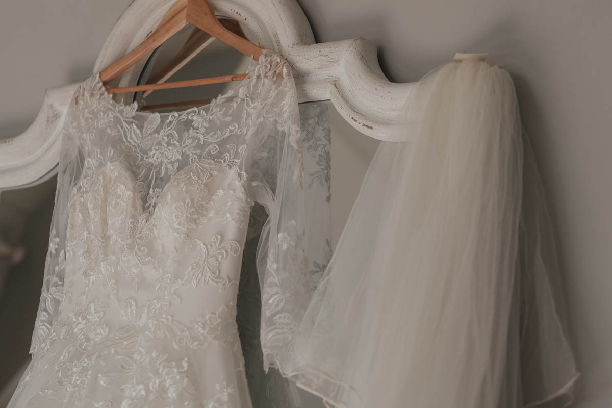 the bridal gown and veil