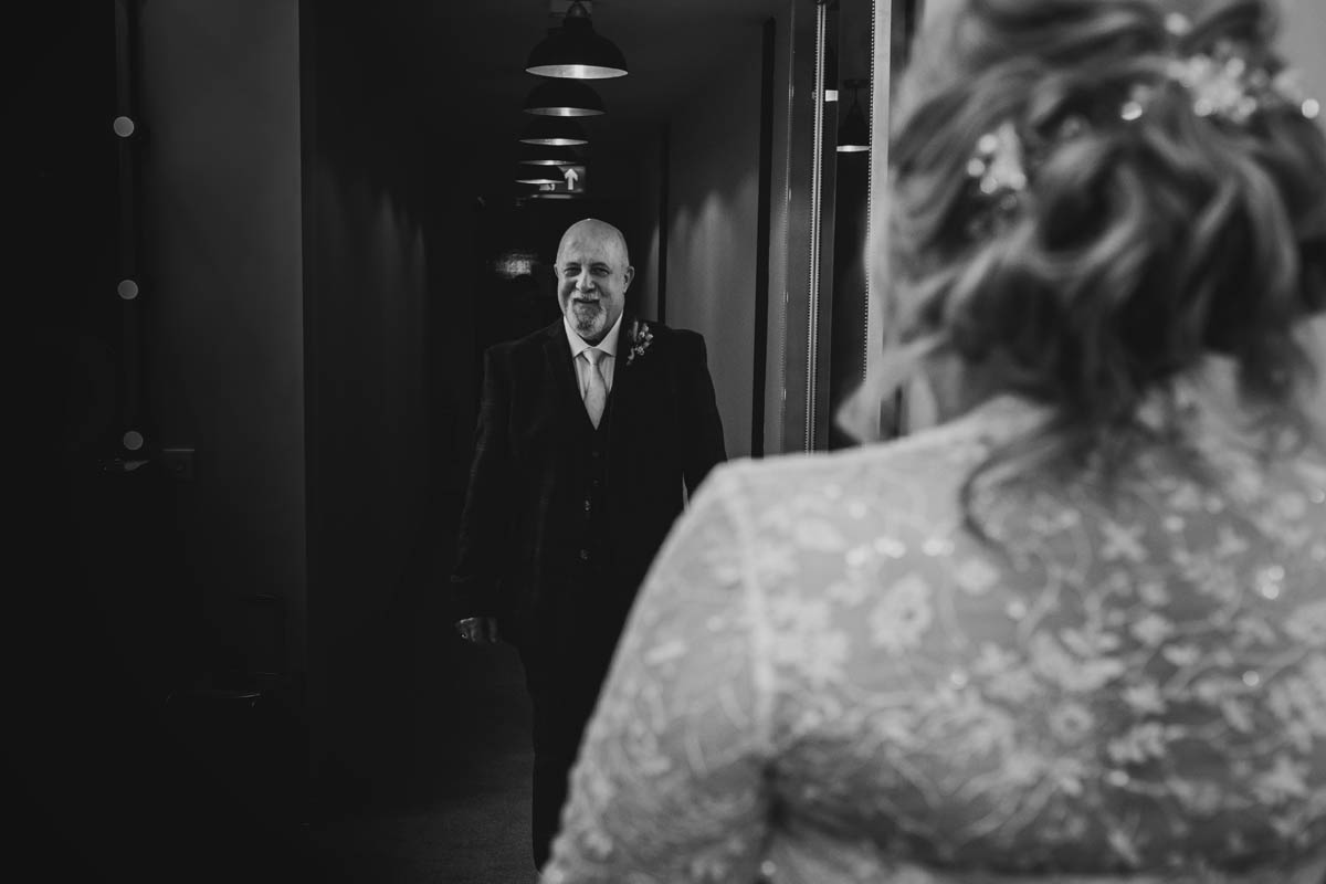 dad see's his daughter ready for her wedding for the first time