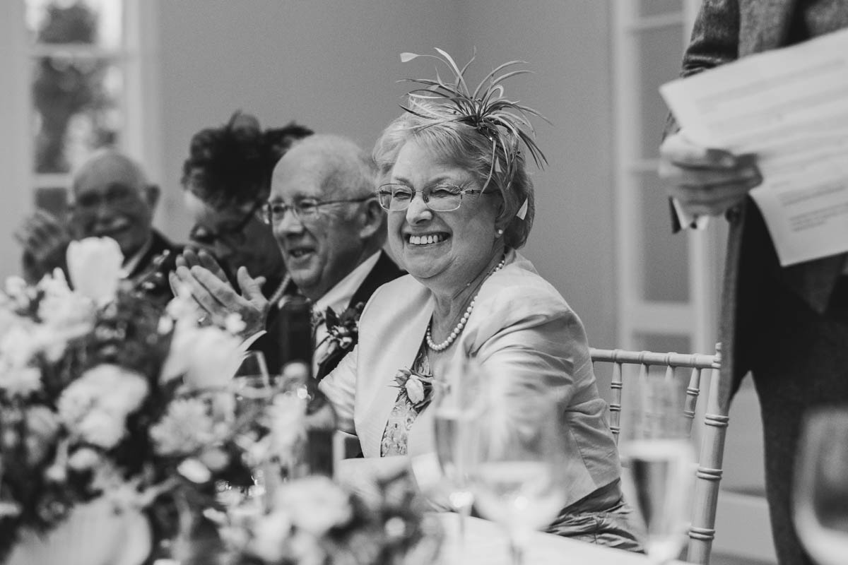 bride's mum laughing at the speech