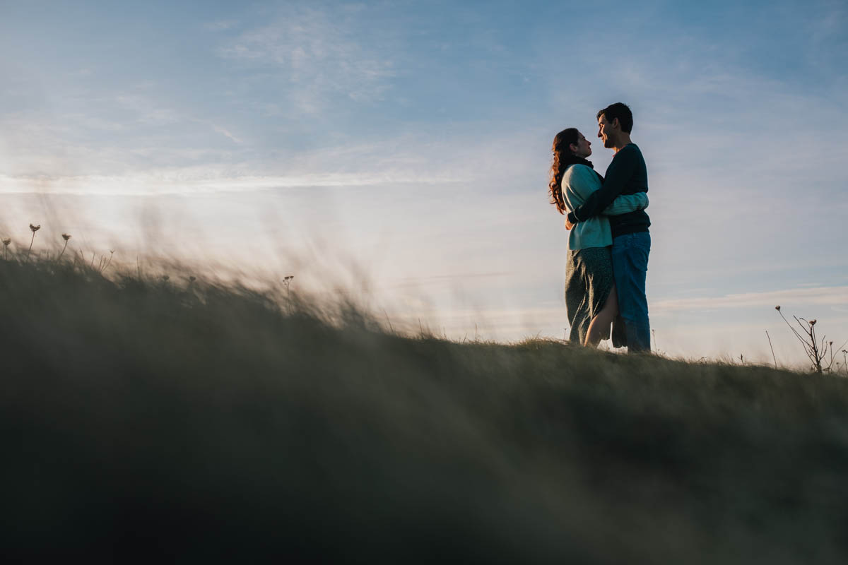  couple embrace on charmouth cliffs