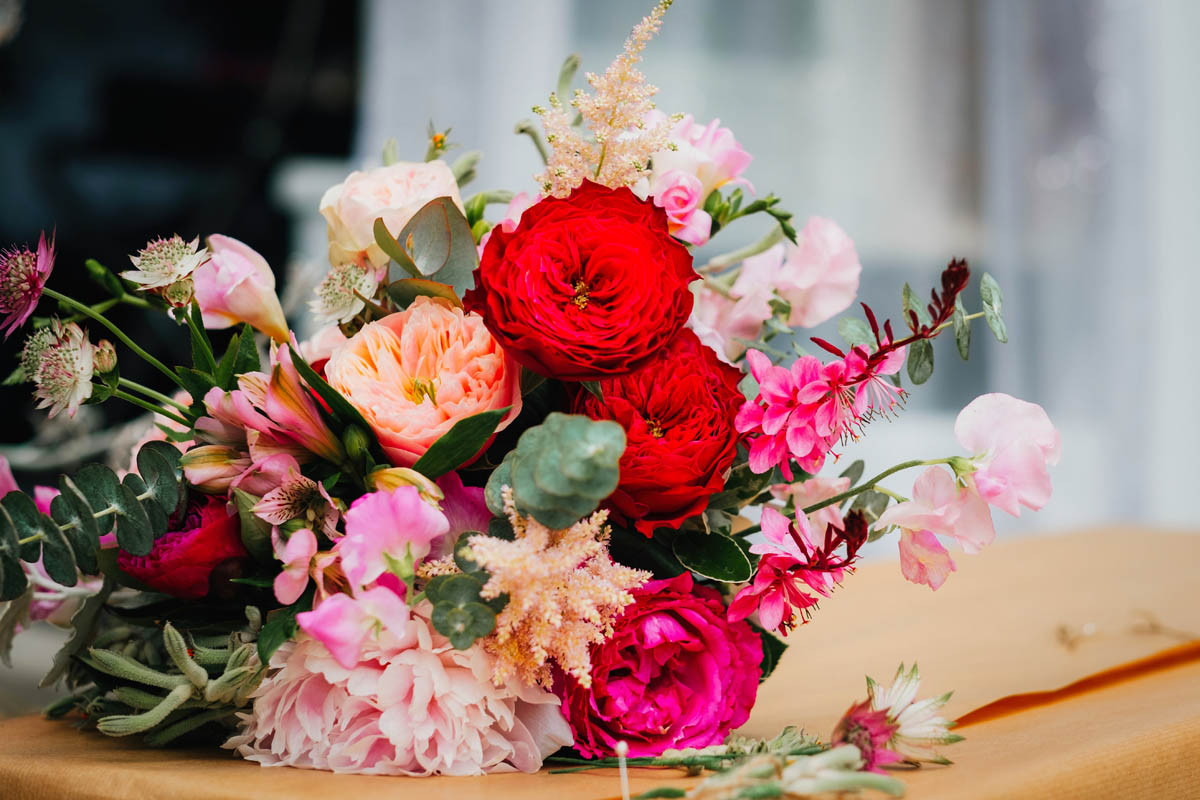bridal bouquet in pinks and reds