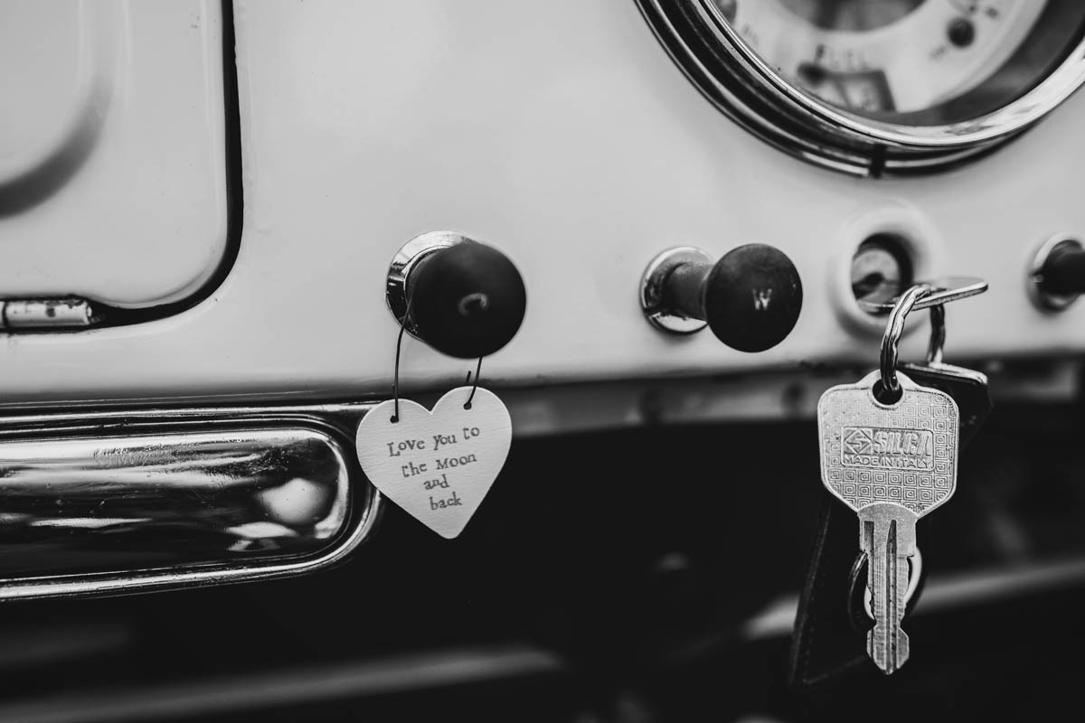the keys to a Morris Minor and a sign saying "love you to the moon and back"