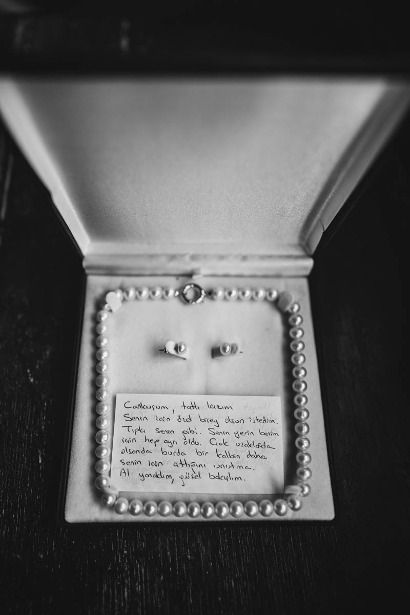 wedding jewellery - a pearl necklace, pearl earrings and a note from a special friend