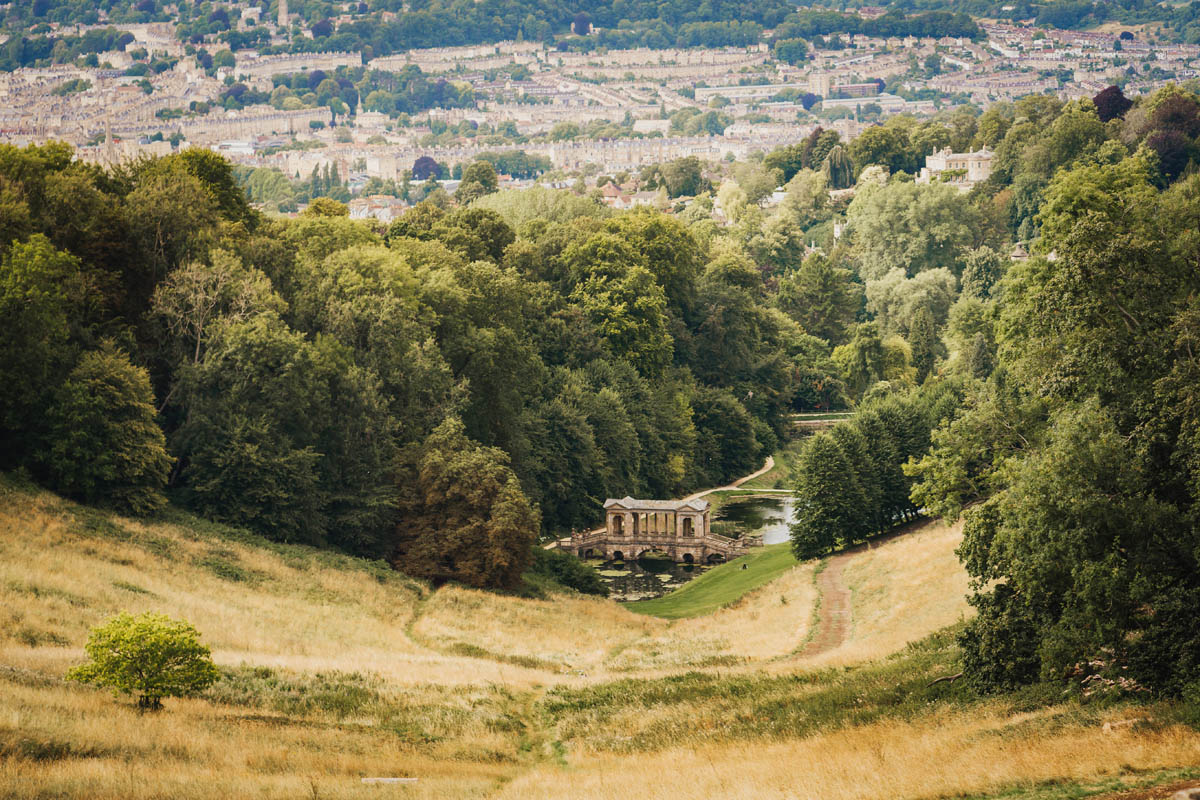 views from Prior Park of the Landscaped Garden, Palladian bridge and Bath city in the background