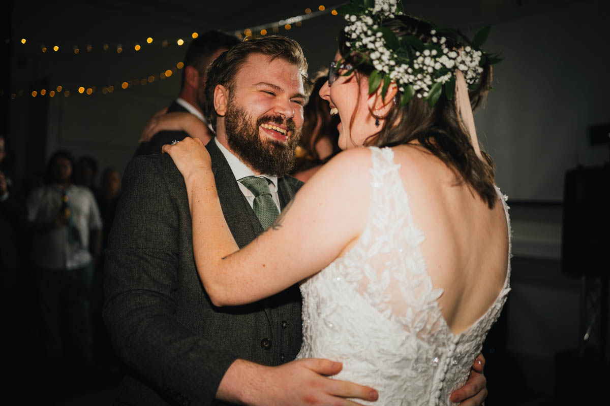 bride and groom sharing their first dance as newly weds