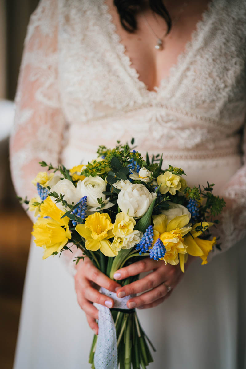 bridal bouquet with daffodils, roses and bluebells
