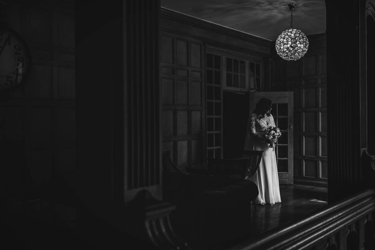 the bride walking towards her wedding ceremony at Coombe Lodge