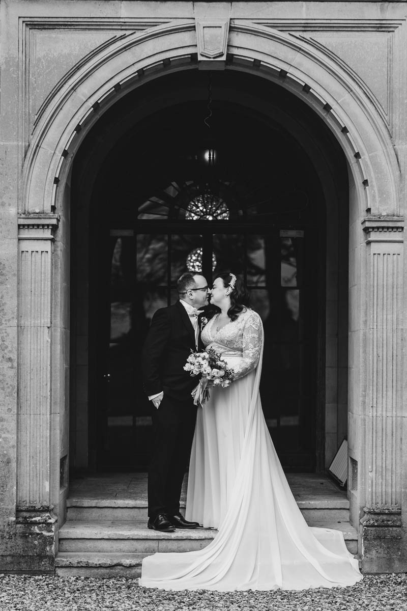 a black and white portrait of a couple at Coombe Lodge wedding venue