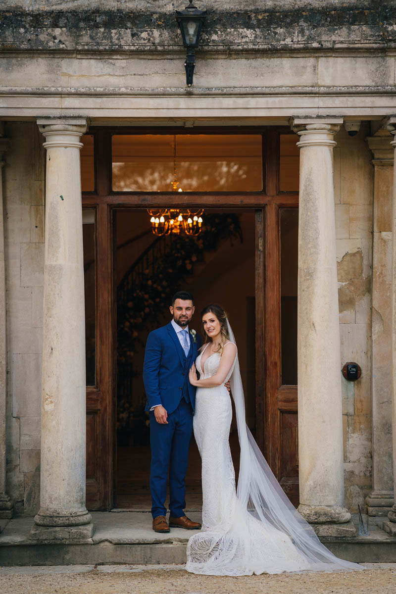 bride and groom in the doorway at eastington park