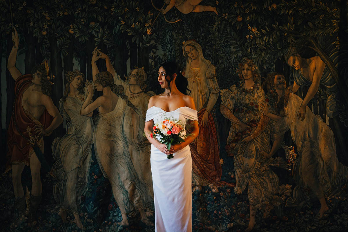 bridal portrait in front of a tapestry