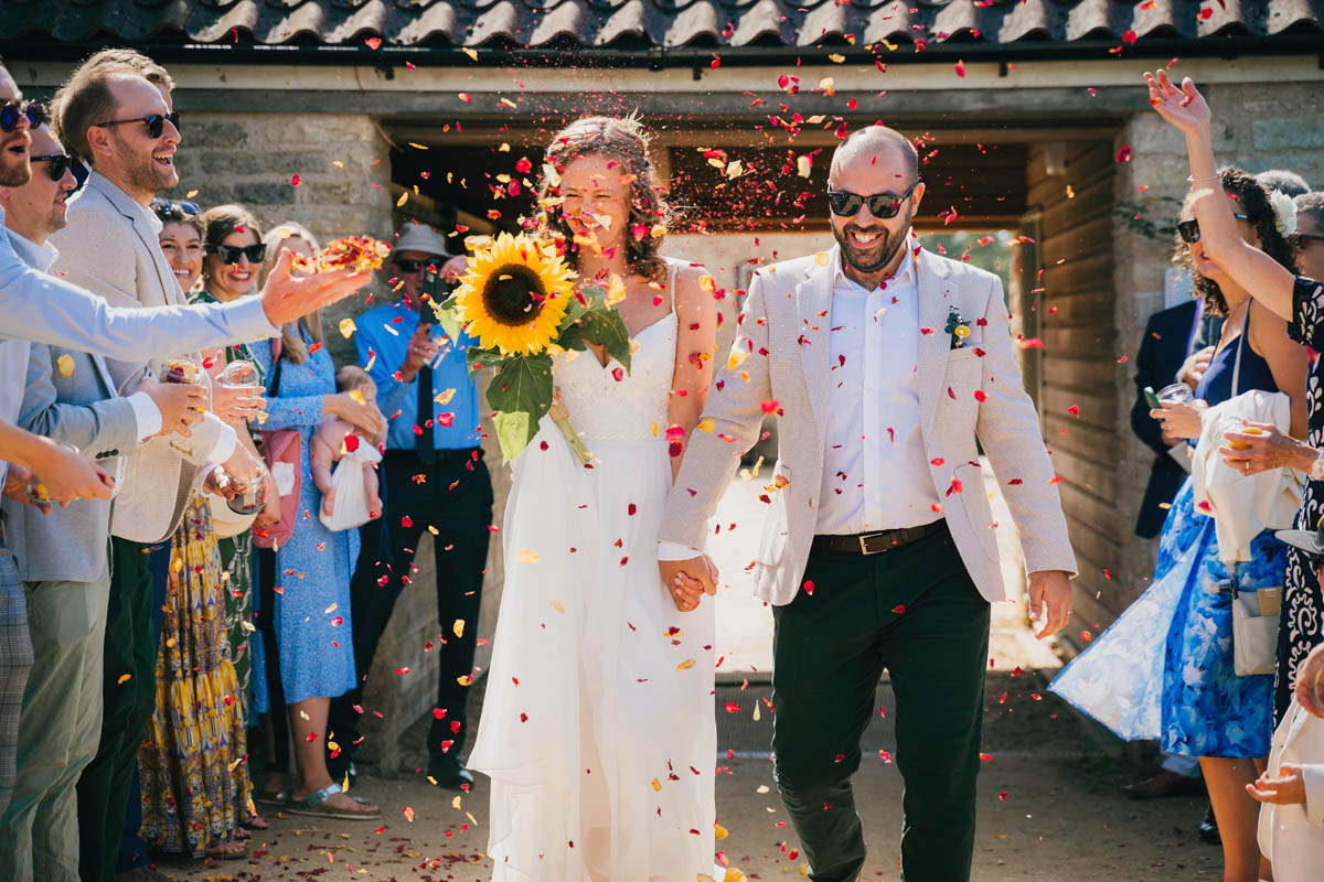 confetti throwing over the bride and groom