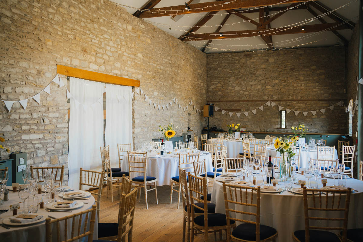 the oak barn decorated and ready for the wedding breakfast