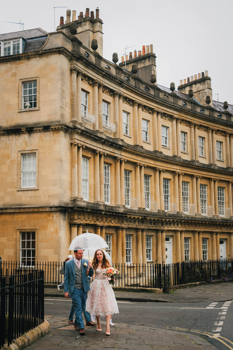 walking through the Circus, Bath are the bride and groom in the rain