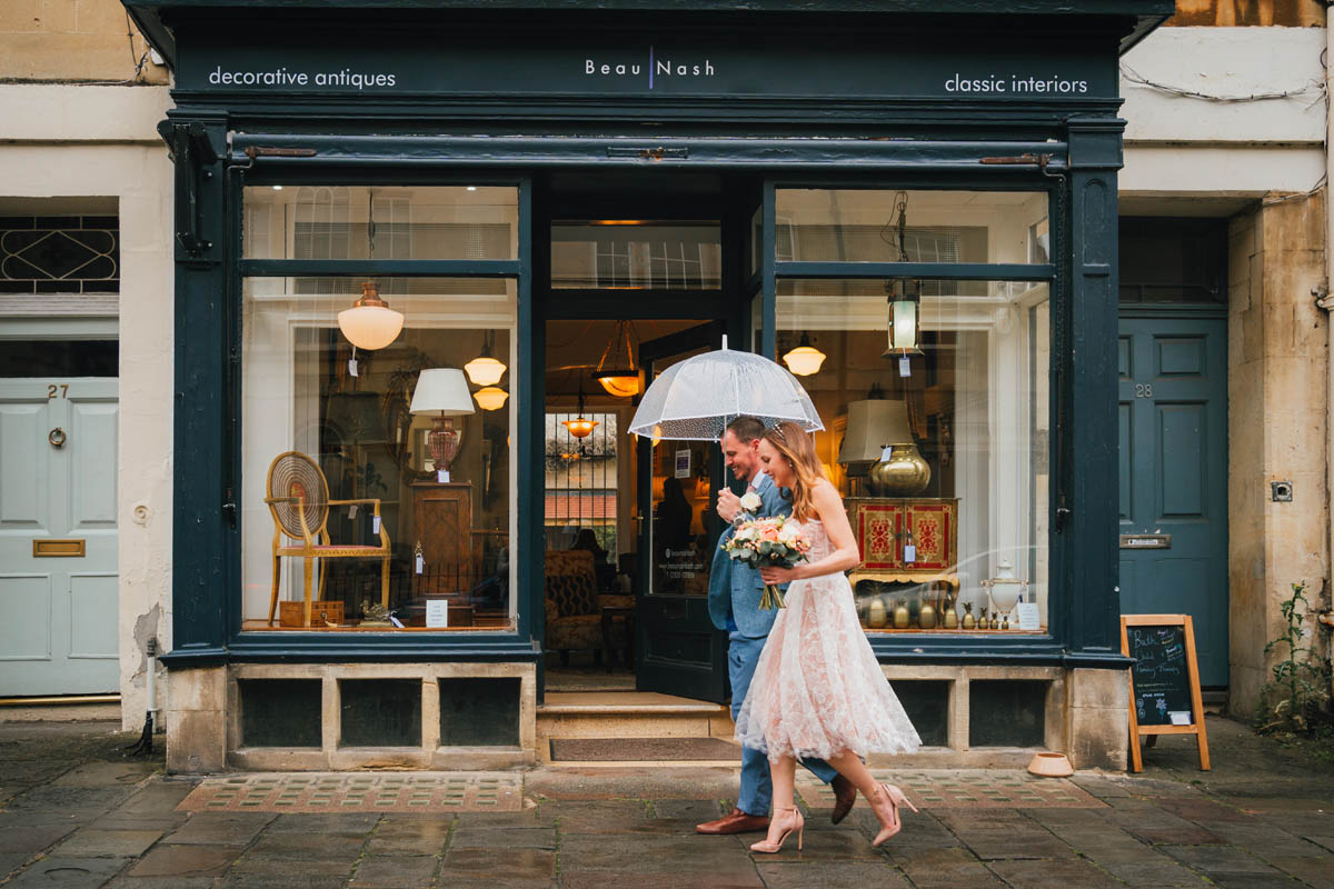 walking through Bath in the rain to the wedding ceremony