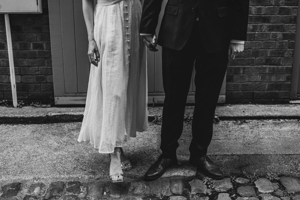 black and white photograph of the cobbled streets in Colston Yard with the newly-weds