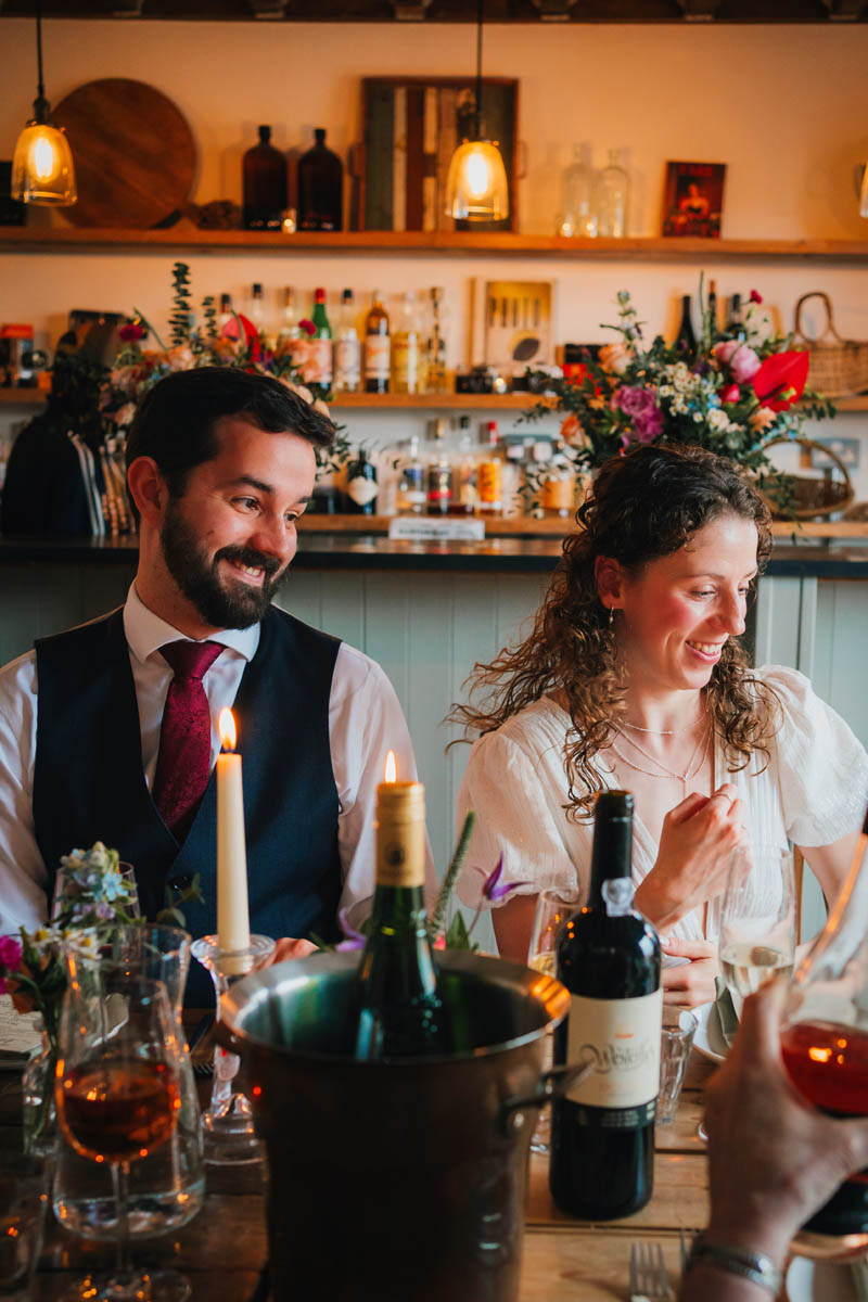 the bride and groom waiting for their meal at the forge Bristol