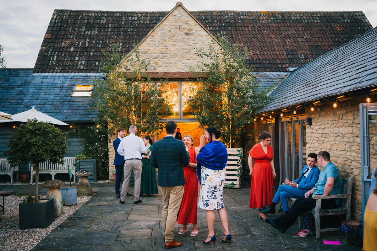 guests enjoying the evening light outside winkworth farm