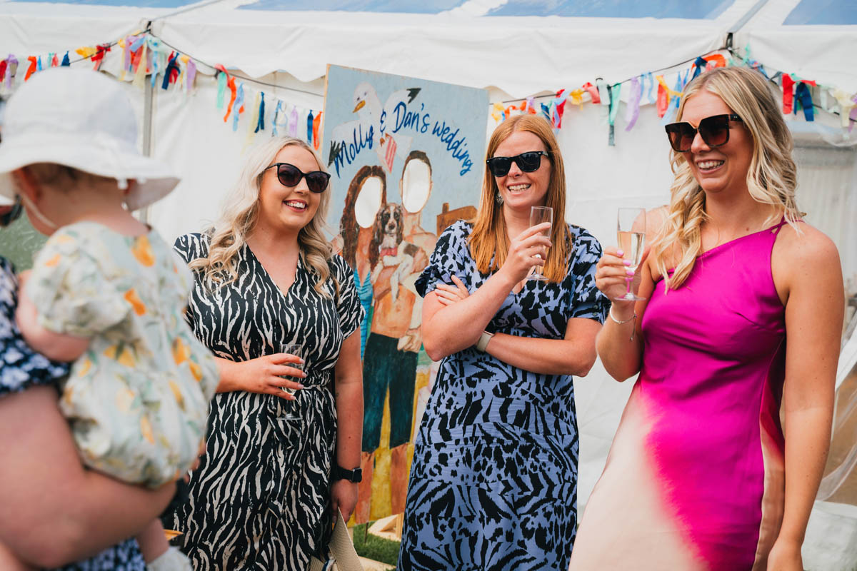 wedding guests during the reception drinks