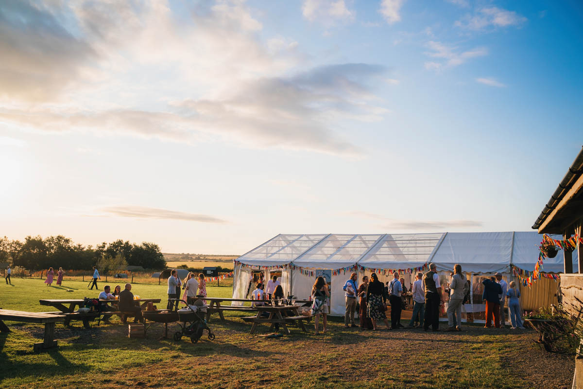 wedding guests during the drinks reception at warren farm