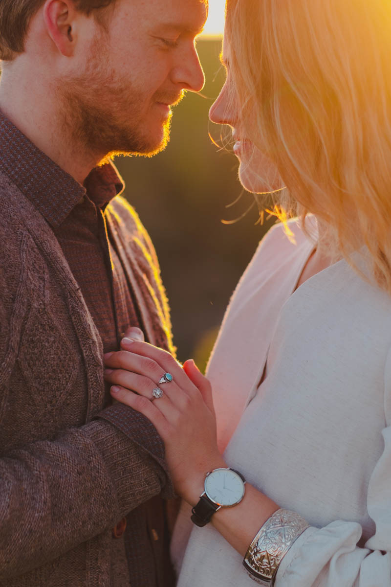 close up of a couple holding hands