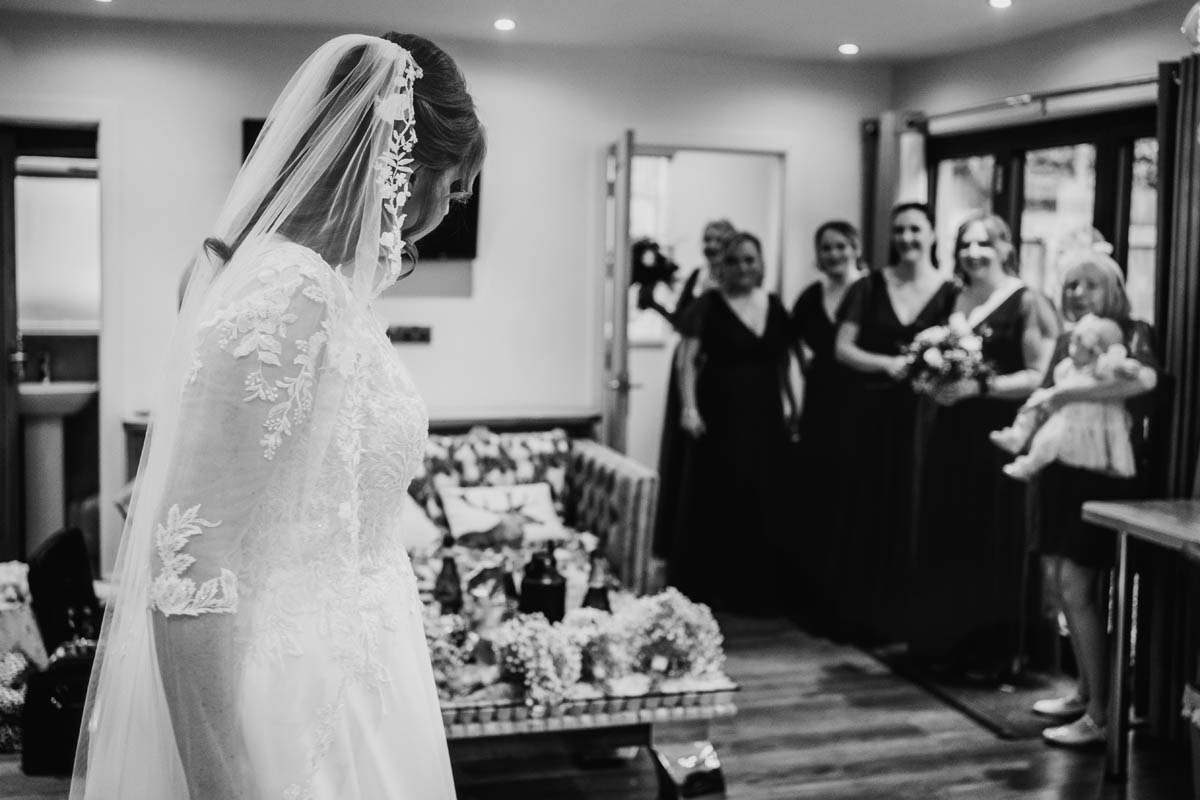 black and white portrait of the bride in her gown
