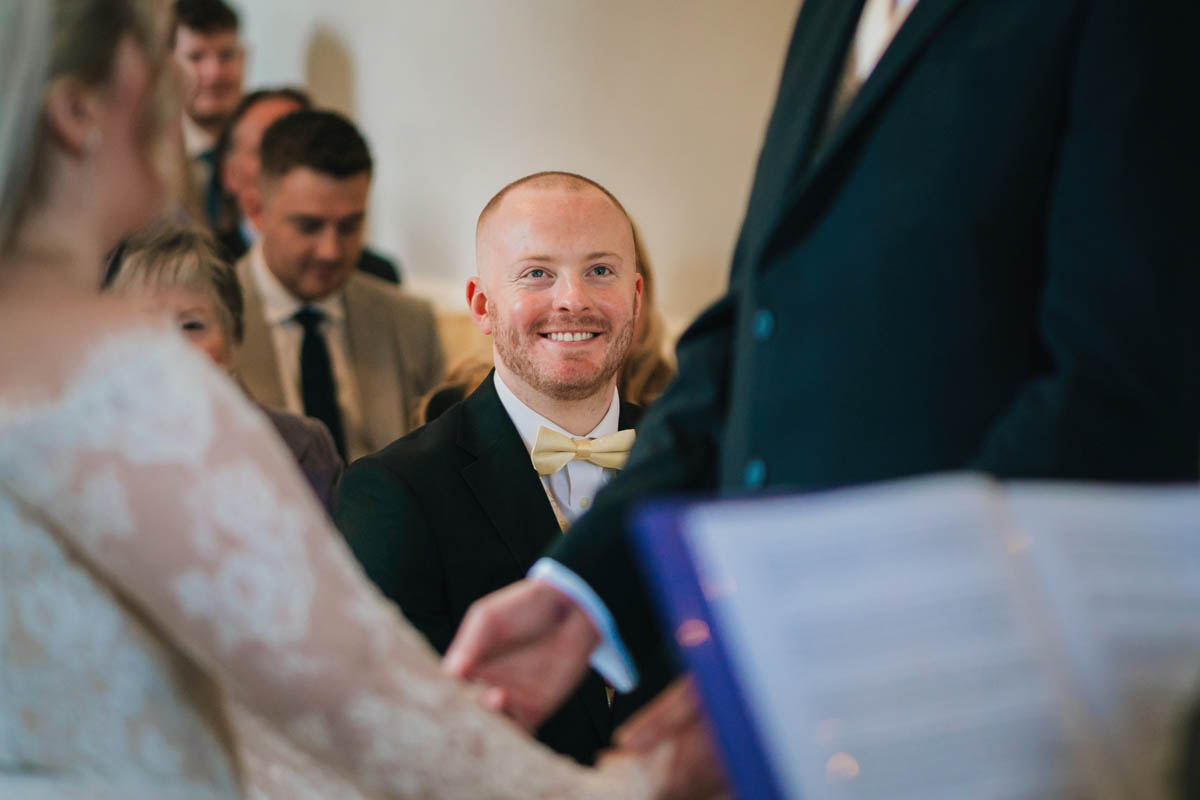 best man smiling