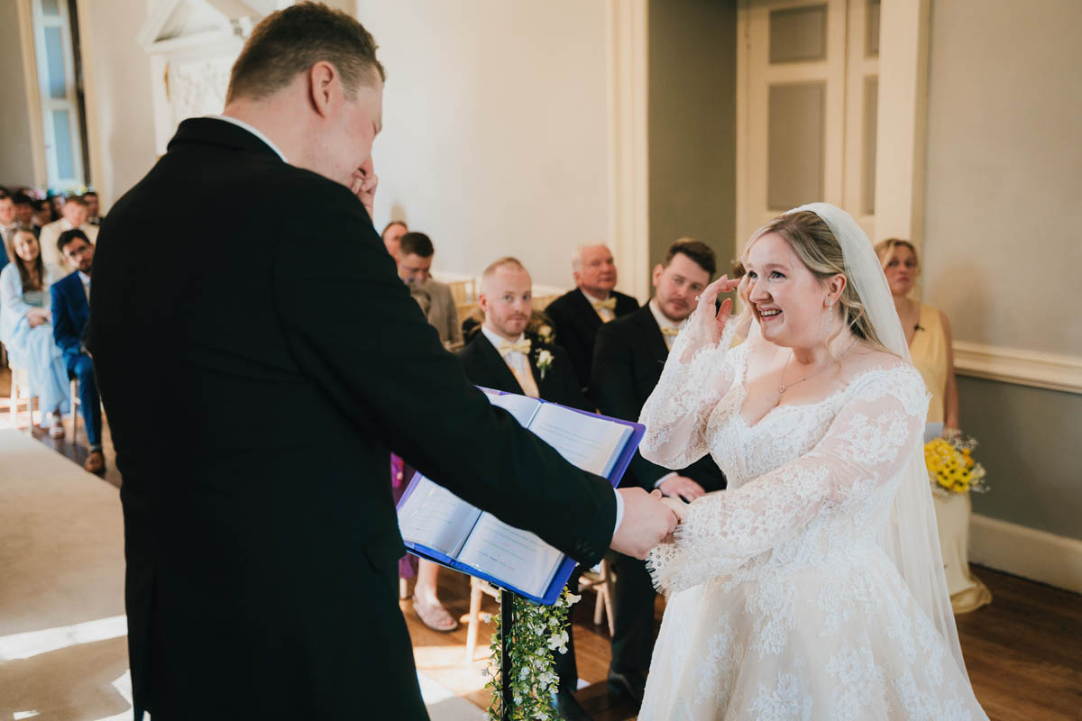the married couple both wipe away tears