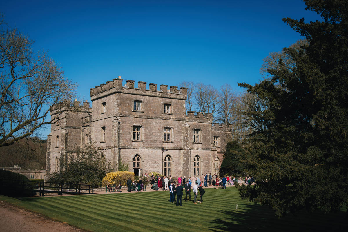 clearwell castle with guests on the lawn